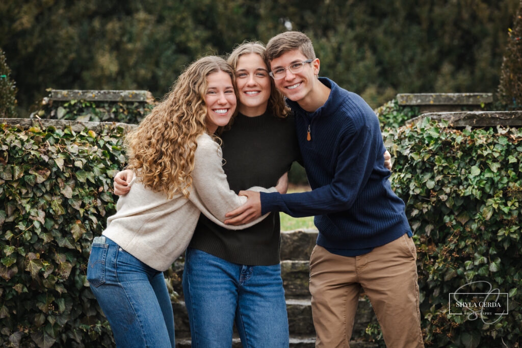 Siblings posing for outdoor family photos in Troy Ohio