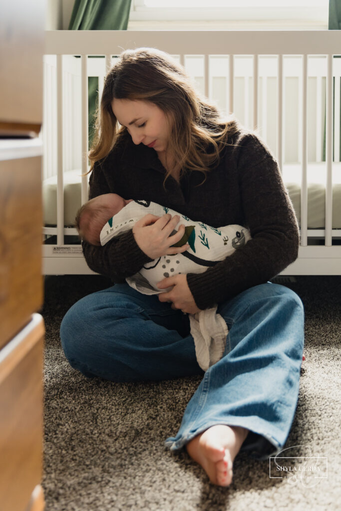 Mom and baby during newborn photos.
